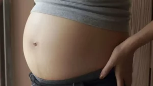 Pregnancy 111 First Signs of a Baby Bump When Will You Notice the Change